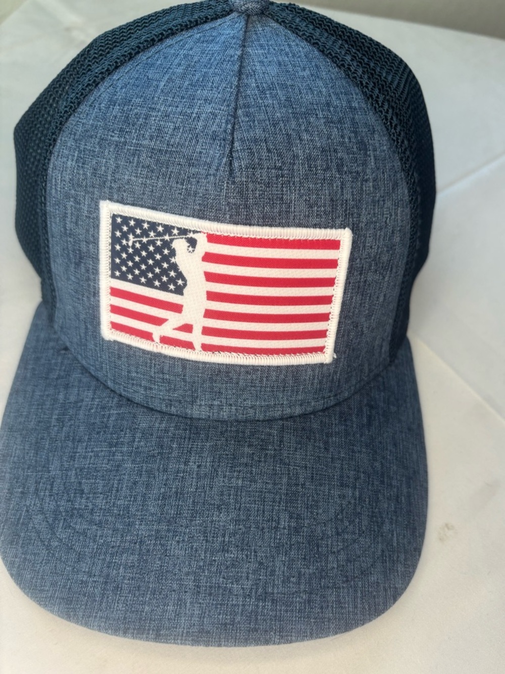 Walter Hagen blue and black mesh trucker hat